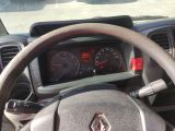 dashboard of a car with a steering wheel and dashboard gauges