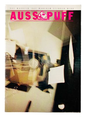 la couverture d'un magazine avec la photo d'une voiture en arrière-plan