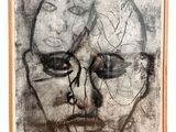 l'image d'un dessin d'un visage d'homme sur une feuille de papier