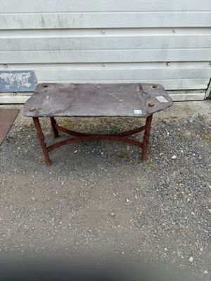 a small table that is sitting on the ground