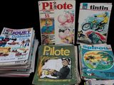 a lot of magazines on a table with a black background