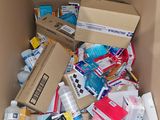 a cardboard box filled with many different types of items