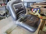 an image of a car seat in a garage
