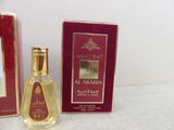 an image of a bottle of perfume next to a box of perfume