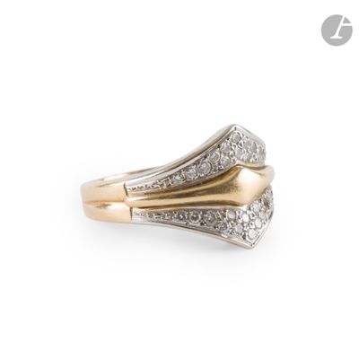 an image of a gold and diamond ring on a white background