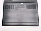 a laptop that is sitting on a white surface