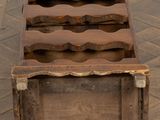 a wooden box with six bottles of wine in it