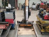 a large machine that is sitting in a garage