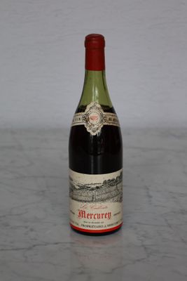 a bottle of wine that is sitting on a table