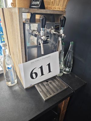 un distributeur de bière sur lequel figure un chiffre