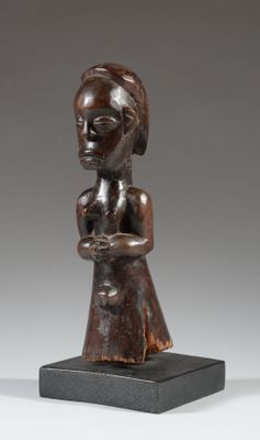 an image of a statue of a woman holding a baby