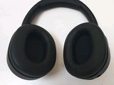 a pair of headphones sitting on top of a table