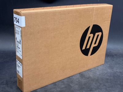the hp logo is on the side of the box on the table