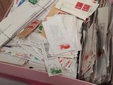 a box full of mail sitting on top of a table