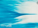 a man riding a surfboard on a wave in the ocean