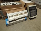 many boxes and boxes of electronic equipment on the floor