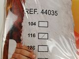a picture of a santa claus costume in the package