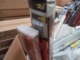 a pile of books and other items in a box