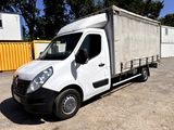 un camion blanc garé dans un parking