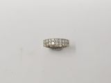 a white gold ring with three rows of diamonds