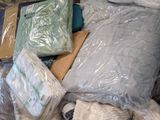 a pile of items that are sitting on the floor