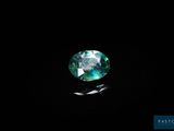 a green tourmaline gems on a black background