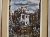 framed painting of a street scene with a building in the background