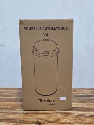 a cardboard box with a brown lid sitting on a wooden table