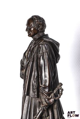 a statue of a man with a sword in his hand