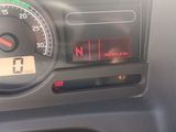 a close up of a car dashboard with a clock on it