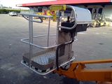 an image of a man on a scissor in a parking lot