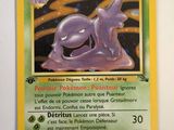 a close up of a pokemon card on a table