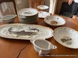 a table with a lot of plates and bowls on it