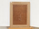 an image of a picture of a wooden frame with writing on it