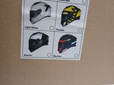 a cardboard box with a picture of different helmets on it