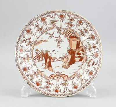 a brown and white plate with a picture of people on it