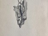 un dessin représentant une feuille de papier sur laquelle se trouve un morceau de papier déchiré