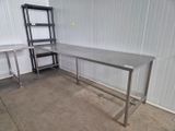 an image of a stainless steel table in a garage