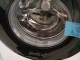 a close up of a washing machine in a room
