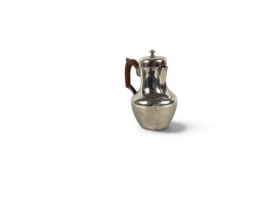 a silver coffee pot with a handle on a white background