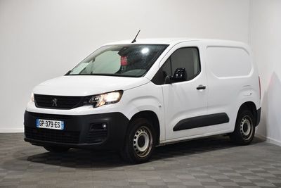 a picture of a white van parked in a room