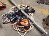 a lot of rope and other items on the ground