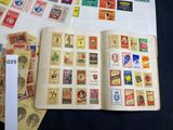 a book with stamps on it sitting on a table