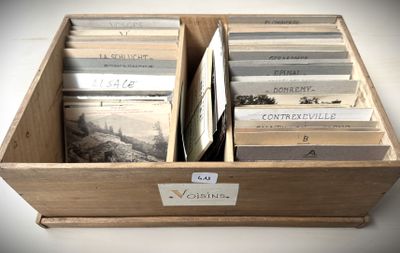 a wooden box filled with old books on a table