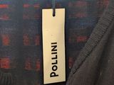 a close up of the label on the back of a sweater