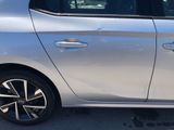 a silver car parked on the side of the road