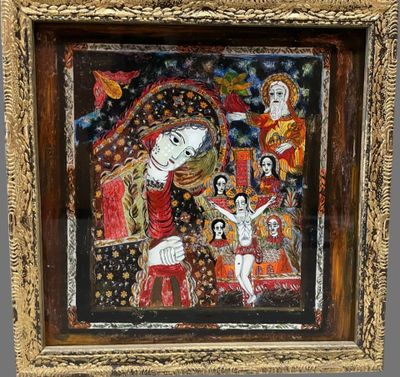un vieux tableau représentant une femme avec un enfant sur les genoux