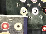 many different types of rugs on display in a store