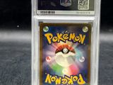 a close up of a pokemon trading card in a clear holder
