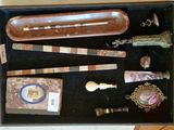 a box with various items in it on a table